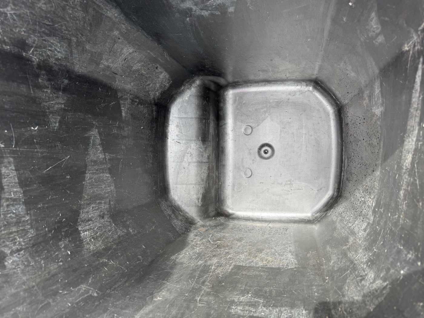 Clean grey bin interior after professional cleaning